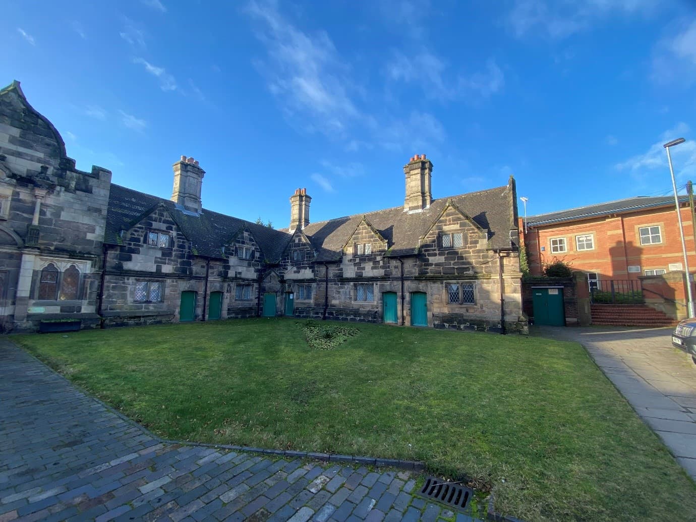 Courtyard view of Grated II listed building Almshouses in Stafford.